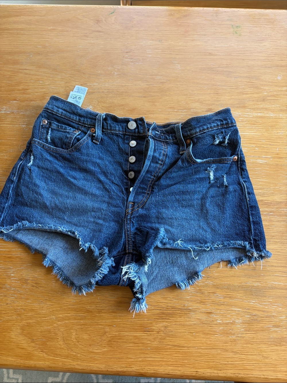 High-Rise Levi Dark Denim Cutoff Shorts with Button Fly